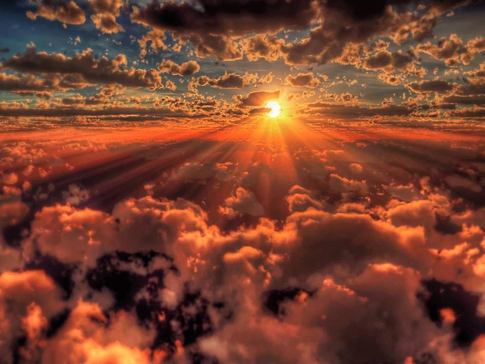 Sunset Over Clouds